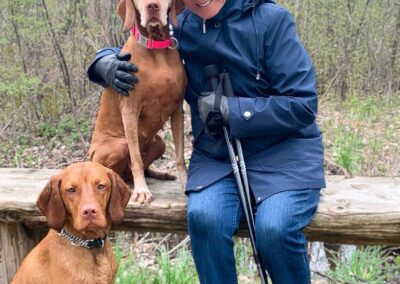 Two vizslas, Zuri and North with Lynn's mom